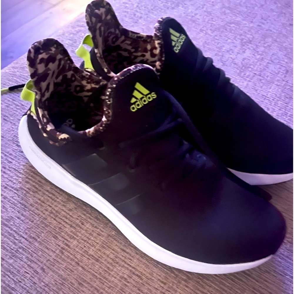 NWOT ADIDAS running shoes. Never worn.